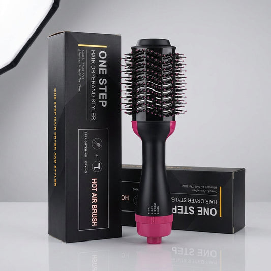 Black and pink One Step Hot Air Brush dryer and styler with its box